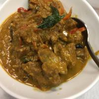 Mamsam Koora · Spicy gravy with red chili, coriander, yogurt and andhra spices. Served with basmati rice. H...