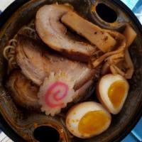 Miso Ramen · Tonkotsu pork broth, miso sauce, soft boiled egg, in straight noodles with homemade roast po...