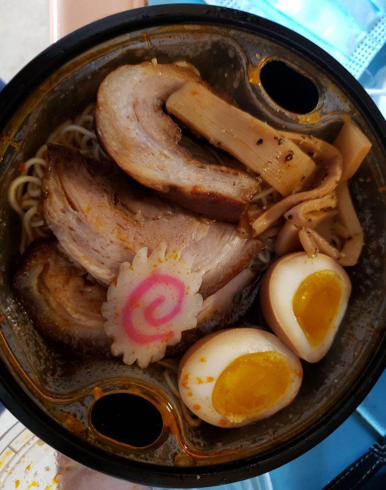 Miso Ramen · Tonkotsu pork broth, miso sauce, soft boiled egg, in straight noodles with homemade roast pork, menma, green onion, seaweed chips.