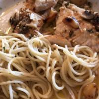 Chicken Marsala · Sauteed chicken breast with mushrooms in Marsala wine sauce. Comes with spaghetti pasta.