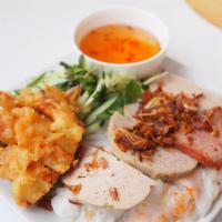 Banh Cuon Thanh Long · Rice paper filled with peppery ground pork and shrimp served with Vietnamese ham, fried shri...