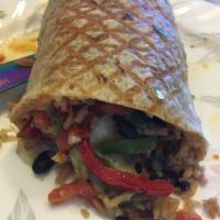 Veggie Burrito · Grilled veggies, rice and beans, sauce, pico de gallo, chips, and lettuce.
