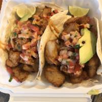 Baja Fish Burrito · Fried or grilled fish, rice, beans, cabbage, pico de gallo,
chips, and special sauce.