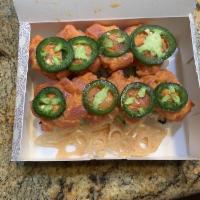 Lotus on Fire Roll · Spicy tuna, lotus root, jalapenos, California roll.