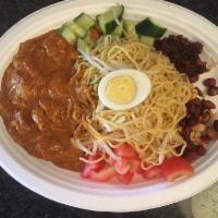 Curry Noodle Chicken · Fresh yellow noodle serve with home-made curry chicken, tofu, cabbage, boiled egg, sambal ch...