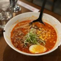 Spicy Curry Ramen · Spicy sesame curry broth, pulled pork char siu, seasoned egg, scallion, bean sprout, bamboo,...