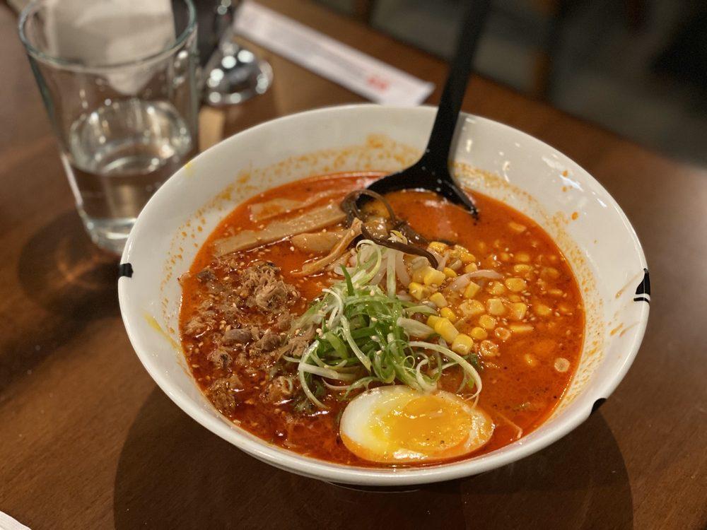 Spicy Curry Ramen · Spicy sesame curry broth, pulled pork char siu, seasoned egg, scallion, bean sprout, bamboo, kikurage, corn, wavy noodles and medium or extra spicy.