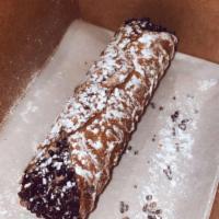 Cannoli · House-made pizzelle shells, ricotta, and mascarpone chocolate chip filling, chocolate sprink...