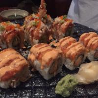 Mountain Roll · Shrimp tempura, spicy tuna, avocado and crunch with chefs sauce.