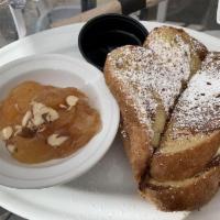 Stuffed French Toast · Brioche French toast stuffed with cheesecake filling and strawberry preserves. Served with a...