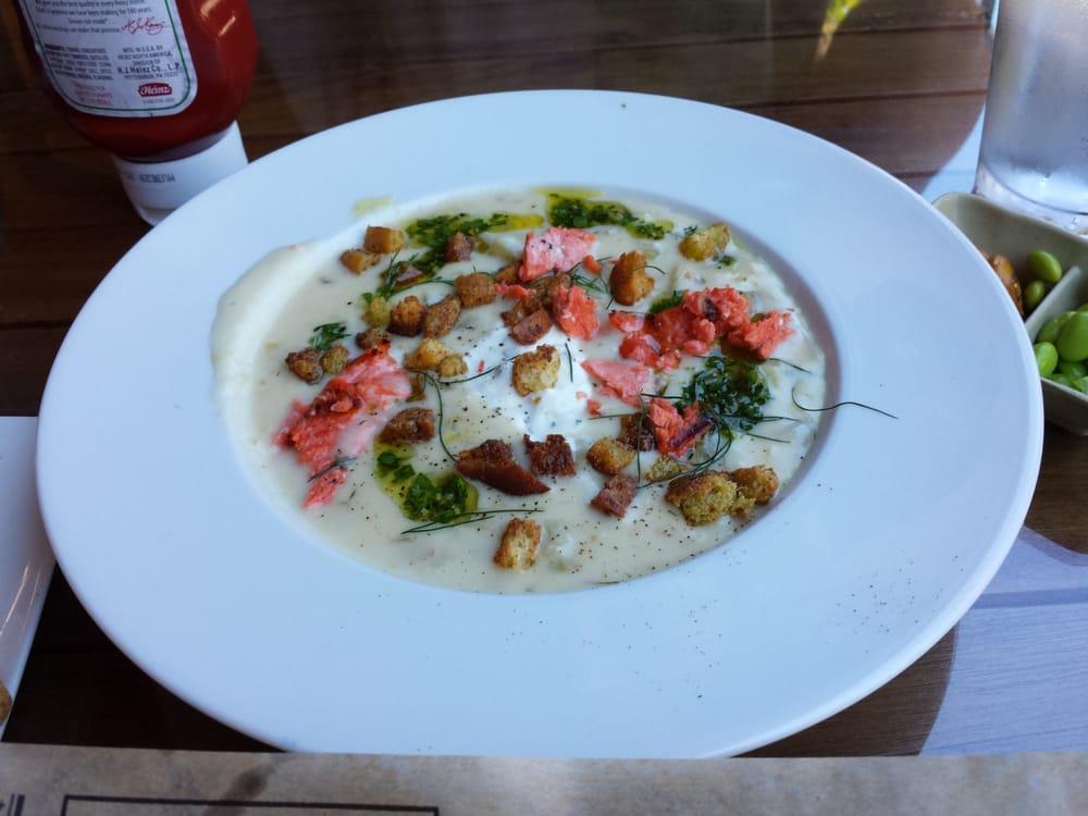 Salmon Chowder · house-made creamy chowder, applewood bacon, yukon gold potatoes, lemon oil, grilled bread for dipping
