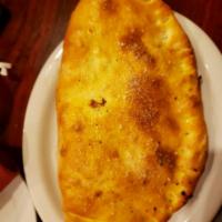 Calzone · Buono's stuffed pizza with your choice of 2 ingredients. Extra ingredients for an additional...