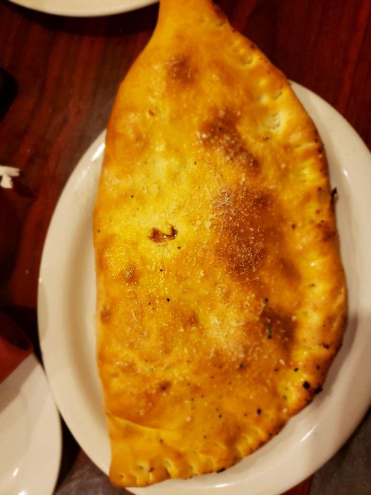 Calzone · Buono's stuffed pizza with your choice of 2 ingredients. Extra ingredients for an additional charge.