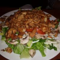 BBQ Chicken Salad · Chopped fresh romaine, chunks of chicken breast marinated with BBQ sauce, mozzarella cheese,...