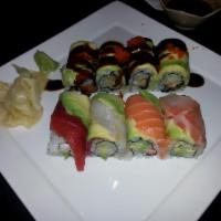 Rainbow Roll · Crab meat, cucumber and avocado wrapped with raw fish and avocado on top.
