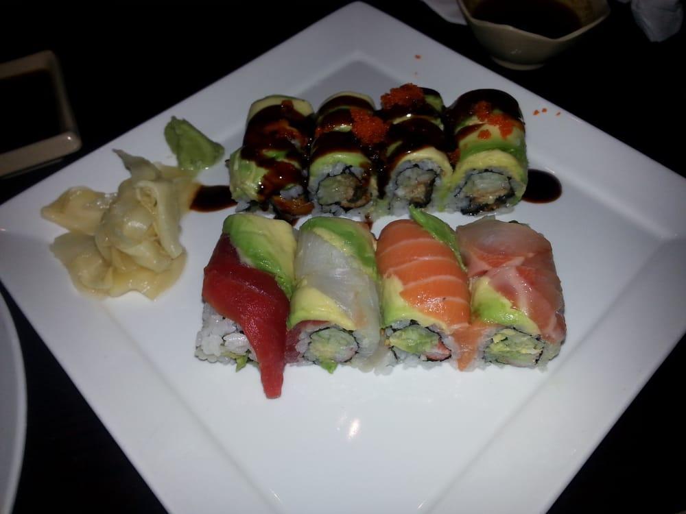 Rainbow Roll · Crab meat, cucumber and avocado wrapped with raw fish and avocado on top.