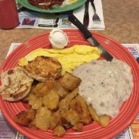 Country Fried Steak · Served with 2 eggs, home fries, biscuit, and gravy.