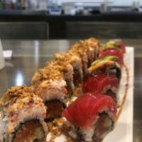 Dragon Roll Special · Spicy tuna, cucumber, eel tuna, avocado, eel sauce, and black pepper.