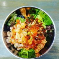 Asian Chipotle Poke Bowl · Scallion, white onion, masago, Asian chipotle sauce, wild-caught tuna, salmon, and jalapeno.
