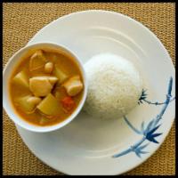 Massaman Curry · Potato, carrot, and peanut. Served with Jasmine rice and (1) Eggroll.