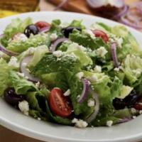 Greek Salad · Romaine, pepperoncini, onions, tomatoes, cucumbers, carrots, feta and olives.      