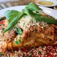 Lasagna · Classic lasagna with layers of Bolognese sauce and cheese.