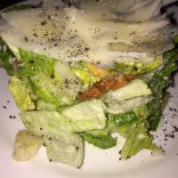 Caesar Salad · Crisp romaine lettuce, shaved Parmesan, croutons and traditional Caesar dressing. Add grille...