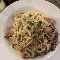 Carbonara Pasta · Bacon, ham, onions, extra virgin olive oil and eggs.