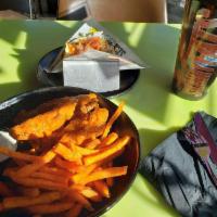 Buff Chix · #LiveHappy - Fried Buffalo chicken tenders with truffle fries and ranch. Spicy.