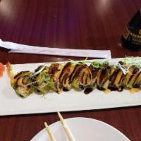 Fire Dragon Roll · Cooked. 2 shrimp tempura, cream cheese, cucumber, and avocado in soy bean wrapper and topped...