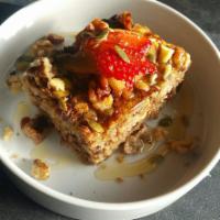 Baked Oatmeal · Served with mixed fruit, nuts and honey.