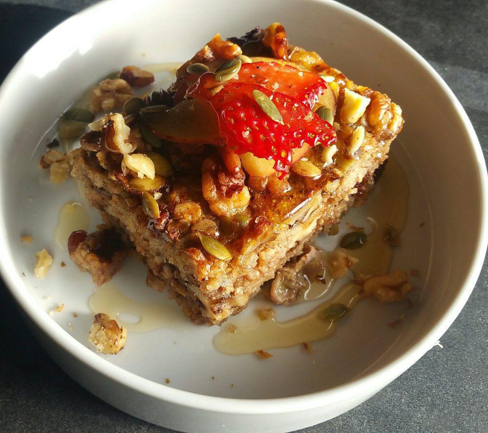 Baked Oatmeal · Served with mixed fruit, nuts and honey.