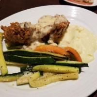 Fried Chicken · Jumbo Chicken Breast pounded thin and fried with a buttermilk sage batter.  Served with mash...