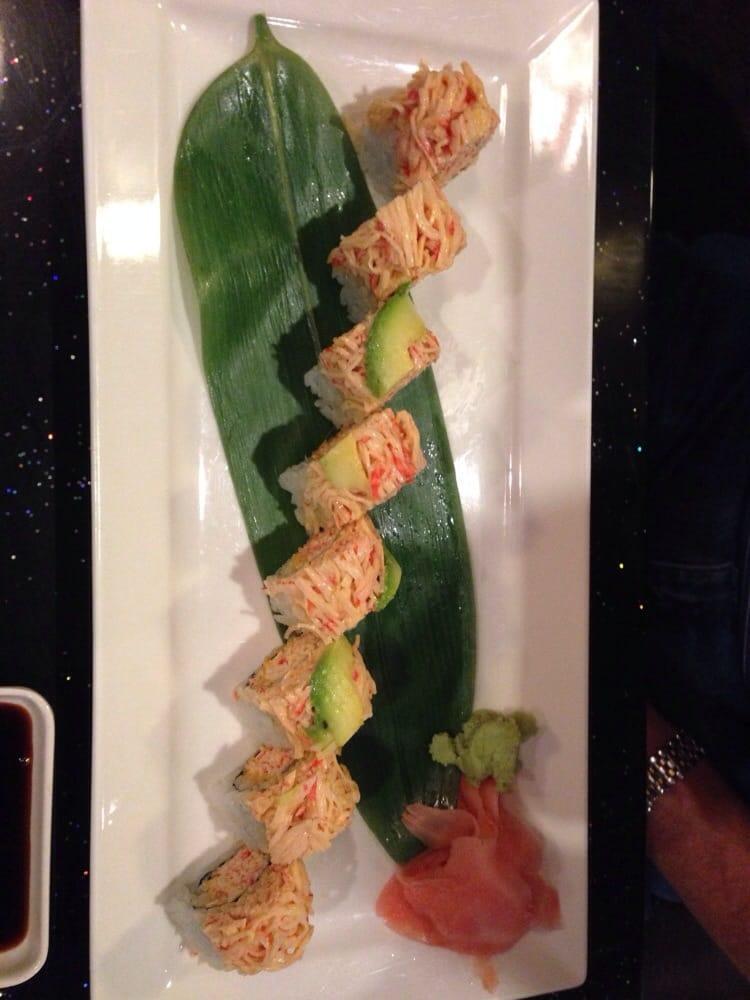 Spicy Kani Roll · Spicy crab and crunch inside, topped with spicy crab and avocado.