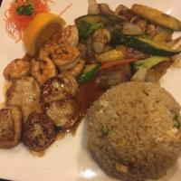 Hibachi Shrimp and Scallops Combo · 5 pieces of shrimp and 5 oz. scallops. Served with soup, salad, grilled vegetables, 2 pieces...