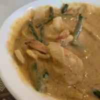 Panang Curry · Peanut based curry sauce with Panang curry paste, fresh long beans, red bell peppers, onions...
