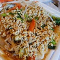 Curry Pad Thai Noodles · Savory stir fried noodles with a red curry house special Thai sauce. Juicy and flavorful.