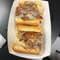 Bronx Bomber · A combination of our homemade meatballs and sweet Italian sausage, covered in marinara with ...