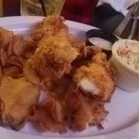 Fish and Chips · Beer battered white fish, fried too a golden brown served with house made chips and fresh co...