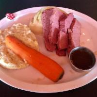 Corned Beef and Cabbage · Marinated and slow roasted in Irish Stout, served with roasted cabbage and colcannon.