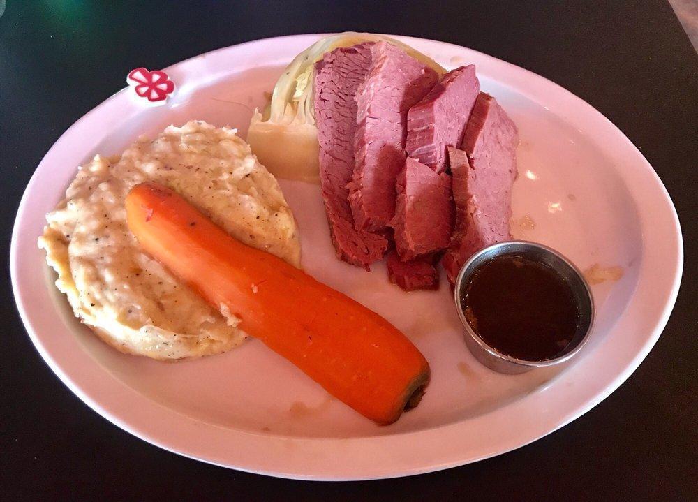 Corned Beef and Cabbage · Marinated and slow roasted in Irish Stout, served with roasted cabbage and colcannon.
