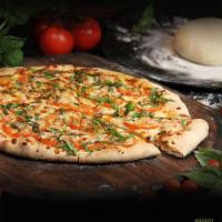 Margherita Pizza · Virgin olive oil, fresh tomatoes, fresh basil, mozzarella cheese, Parmesan cheese and spices...