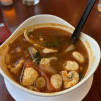 Tom Yum Soup · Lemongrass, mushroom, bell pepper and chili paste.