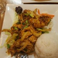Lemongrass Chili Chicken · Tender chicken breast slices stir fried with lemongrass, chili and onion, tossed in rice win...