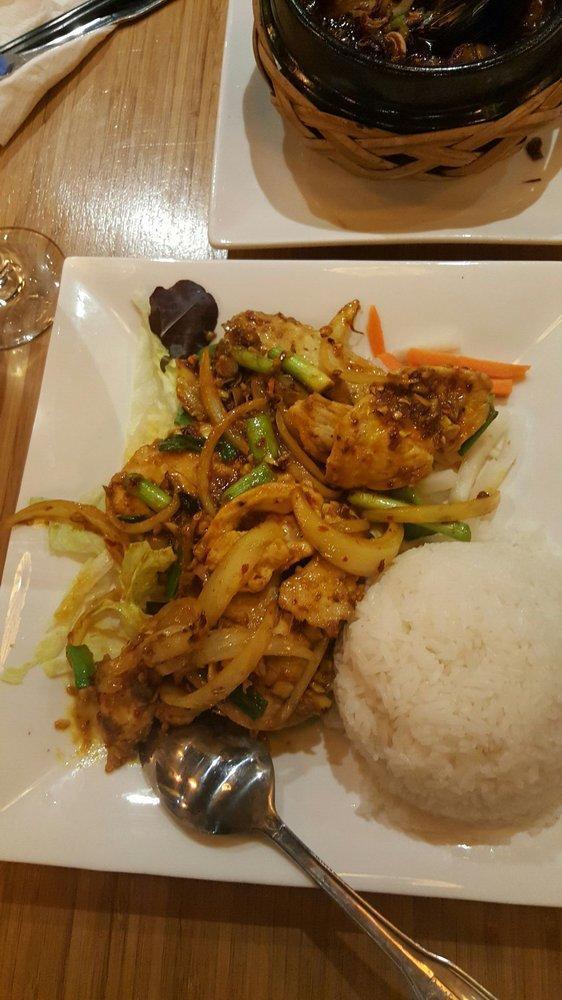 Lemongrass Chili Chicken · Tender chicken breast slices stir fried with lemongrass, chili and onion, tossed in rice wine and garlic oyster sauce, served with jasmine rice. Gluten free.