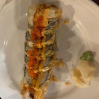 Beautiful Roll · Tuna, salmon, white fish & avocado, deep fried & with tobiko & special sauce.