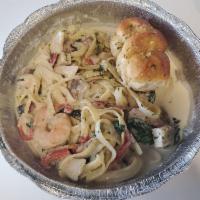 Chicken and Shrimp Carbonara · Served with chicken and 3 jumbo shrimp fettuccine pasta with bacon, roasted red peppers and ...