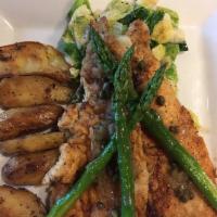 Sauteed Rainbow Trout · Wild-caught trout from Idaho served with sauteed asparagus, roasted fingerling potatoes, and...