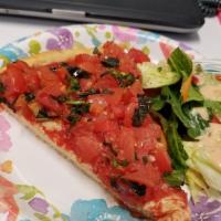 Bruschetta · A tantalizing mixture of crisp basil, fresh tomato, flavorful garlic, capers, and balsamic v...