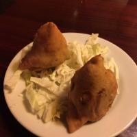 Vegetable Samosas · Crispy pastries stuffed with spiced potatoes and peas. Vegan.
